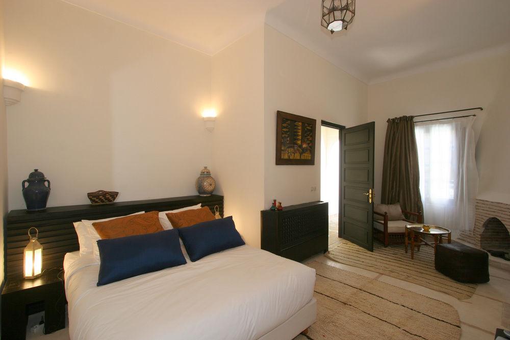 Riad Palais Calipau Marrakesh Extérieur photo A bedroom in the Riad