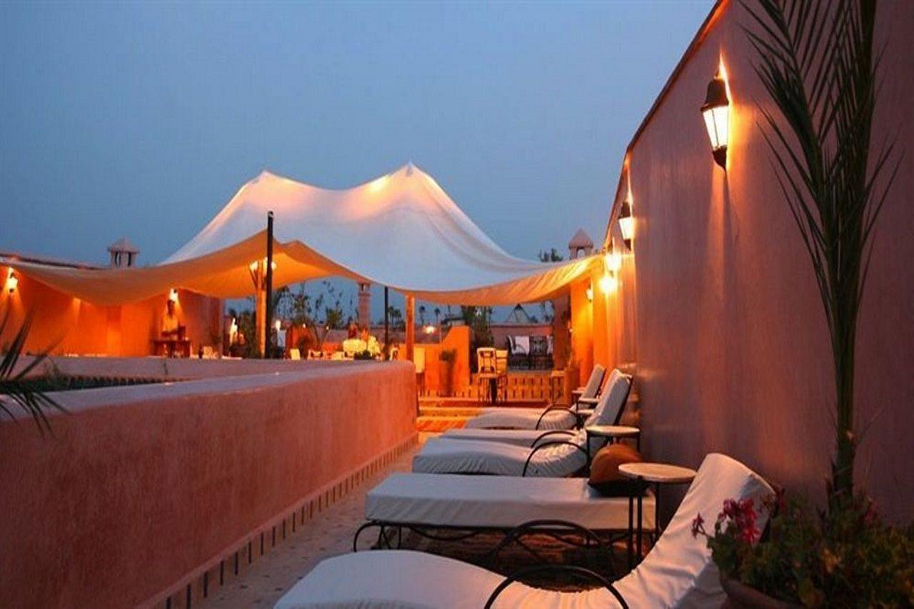 Riad Palais Calipau Marrakesh Extérieur photo Rooftop terrace at the Hotel Aman Marrakesh